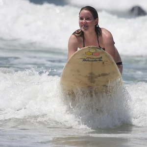 Candid surfer babes on the beach and in bikinis