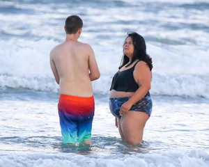 Extra thick girl at the beach in a bikini
