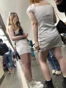 Group of Teens in Short Dresses in a Subway Train and on an Escalator Gallery