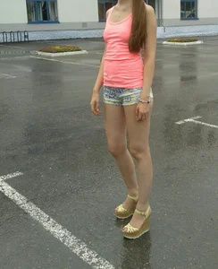 Girl with Small Breast in Mini Shorts and High Heeled Sandals Candid Photo
