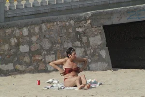 Girls on a nude beach in Sitges, Spain