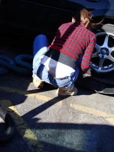 Some candid girls cleaning their cars in jeans and some showing ass crack