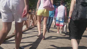 Milf in yellow shorts with vpl and a wedgie