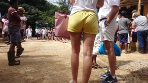 Milf in yellow shorts with vpl and a wedgie