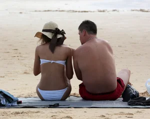 Cute beach girl with decent body in bikini