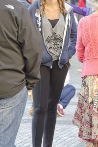 Pretty curly haired girl in tight leggings