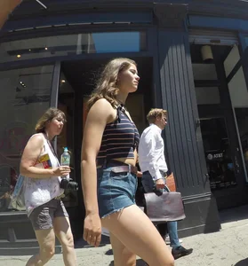 Sexy candid cute cheeky girl out in little denim shorts