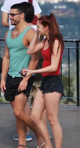 Redhead beauty in short shorts showing some cheeks and panties