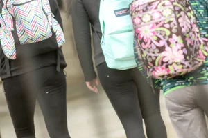 Sexy college babe walking in leggings with a nice ass