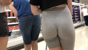 Cute brunette shopping with a nice ass in tight grey shorts with a wedgie