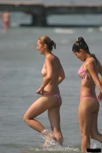 Sexy candid topless and nude beach girls