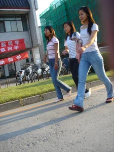 Cute Asian girl with a nice booty in tight jeans
