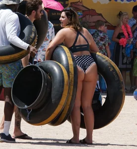 Girls in bikinis getting ready for tubing