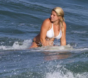 Candid surfer babes on the beach and in bikinis