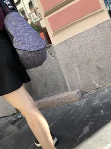 Very nice legs of a candid girl wearing a skirt