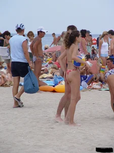 Beach voyeur girls in bikinis, thongs and topless