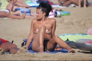 Girls on a nude beach in Bibione, Italy