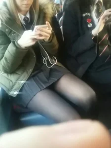 Skinny Young Candid Girl in a Skirt And Black Pantyhose Bus Photo