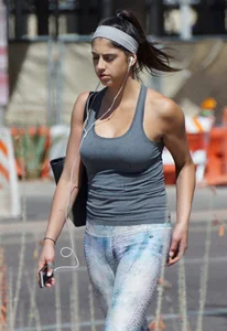 Flat ass brunette walking in leggings with big boobs