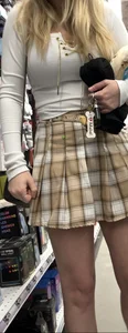 Busty butter face in a skirt and tight top