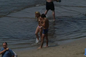 Girls on a nude beach in Sitges, Spain
