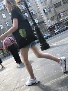 Candid Teen in Denim Shorts And Sneakers With Slim Legs Street Photos