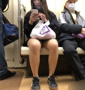 Hot Girl in Pantyhose And a Skirt Creepshots Gallery in a Subway Train and on an Escalator