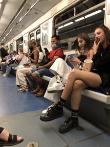 Sexy Teen in Boots  Sitting in a Subway Train With Crossed Legs Pics