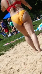 Thick girl with tattoos, big tits and a big booty in a little bikini