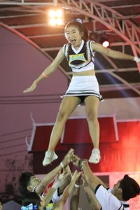 Bunch of athletic Thai cheerleaders at a competition