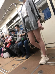 Cute Girl in Shorts and Sneakers With Hot Legs in Subway Train Creepshots Gallery