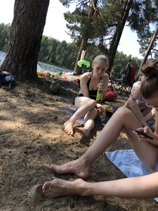 Group of Girls in Swimsuits at a Lake Beach