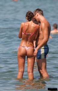 A bunch of sexy beach voyeur babes in bikinis, thongs and topless