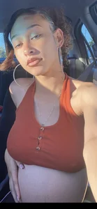 Pregnant skinny girl's selfie in the car