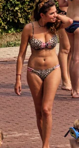 Hot big boobed girl in bikini at the pool