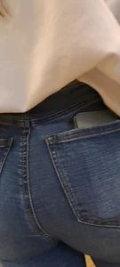 Girl is showing her blue jeans
