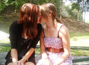 Two skinny girls kissing