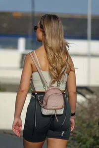Blonde woman in lycra shorts - good front view, back view ruined by a bag