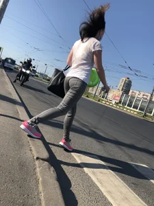 Nice candid girl wearing tight grey sweatpants, a mask and a hat
