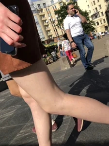 Hot pale legs closeup on the street