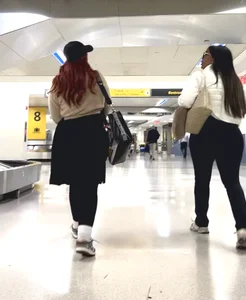 2 pretty ebony juicy booty at airport and bending over