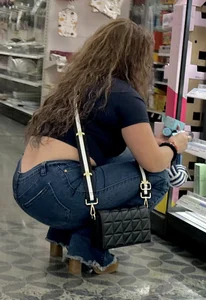 Curly hair lady in jeans @