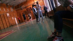 Girl Playing Volleyball in Gymnasium Candid Photos