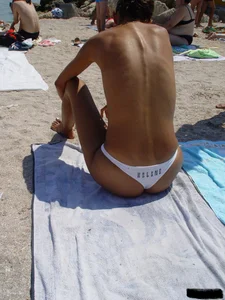 Beach voyeur girls in bikinis, thongs and topless