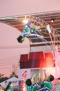 Bunch of athletic Thai cheerleaders at a competition