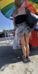 Milf with cheeks out and “Wild” tattoo