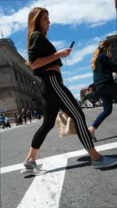 Redhead in black spandex in the sun