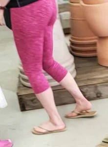 Milf shopping with a nice ass in tight maroon leggings