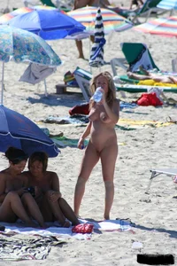 Bunch of sexy ladies on a nude beach