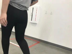 Sexy Amazon employee in leggings with a nice ass